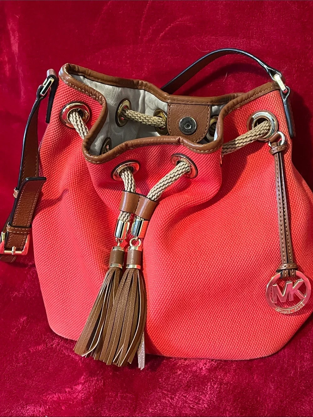 Michael Kors Coral with Brown Trim Tassel Drawstring Shoulder Bag